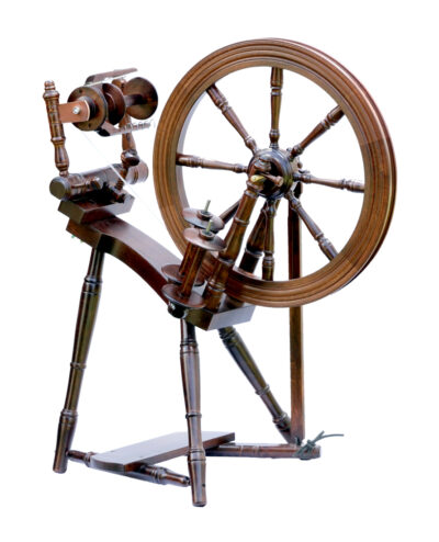 Kromski prelude spinning wheel with single treadle and built in lazykate. Walnut finish