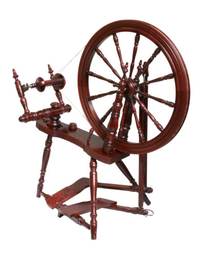 Kromski symphony spinning wheel with double treadle and double drive band. Walnut finish